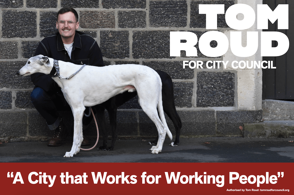 a man with a moustache and very handsome dog with the words 'tom roud... a city for working people